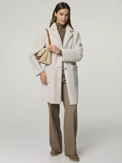 Reversibler Lammfellmantel