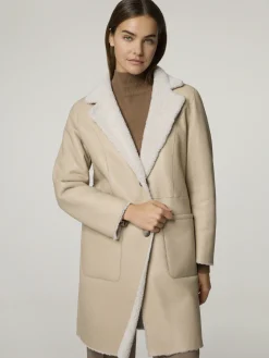 Reversibler Lammfellmantel