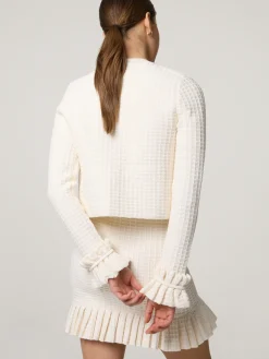 Strickjacke mit Rüschen